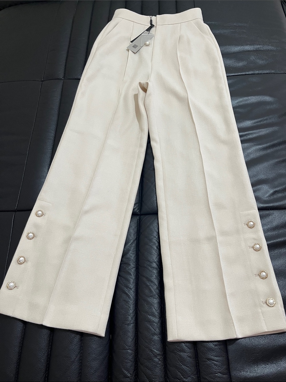 E Cream Mona Studio Wide-Leg Pants with Pearl Buttons.
